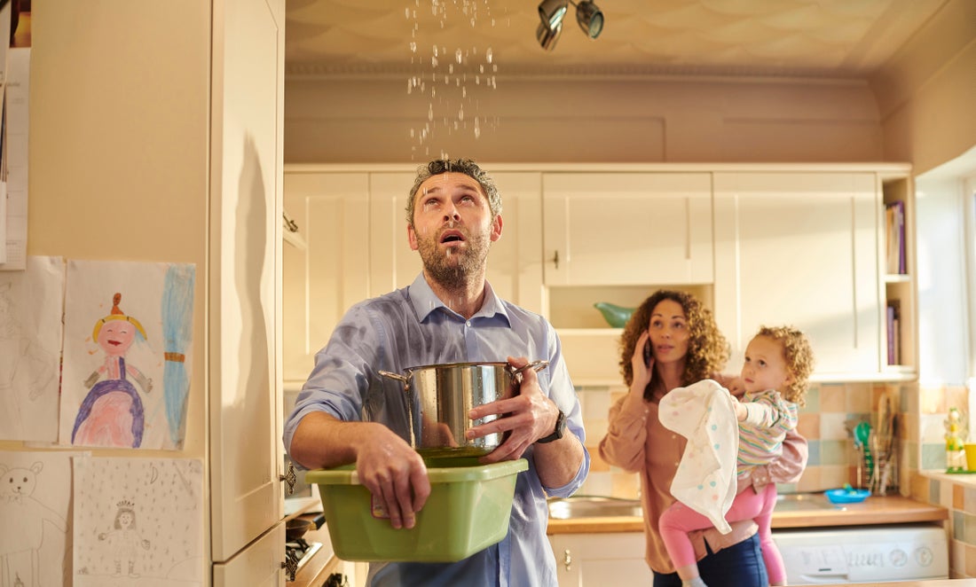 a person standing in a kitchen